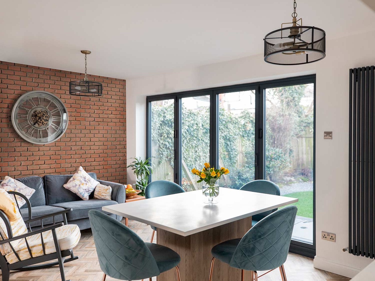 Baked Clay Old Chicago Faux Brick Wall Panel being used as an Airbnb accent wall