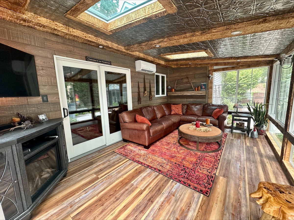 A den area in a cozy cabin with wooden walls