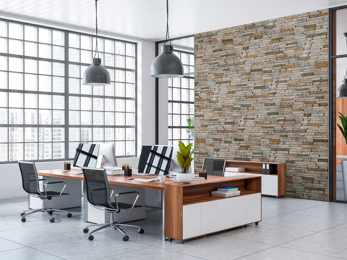 Somerset Dry Stack Faux Stone Wall Panels in Boston color decorating an office wall